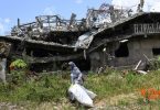 Marawi residents return to their destroyed homes to search for belongings