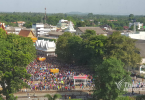 Thousands gather for cash handouts at an ordination ceremony in Ratchaburi