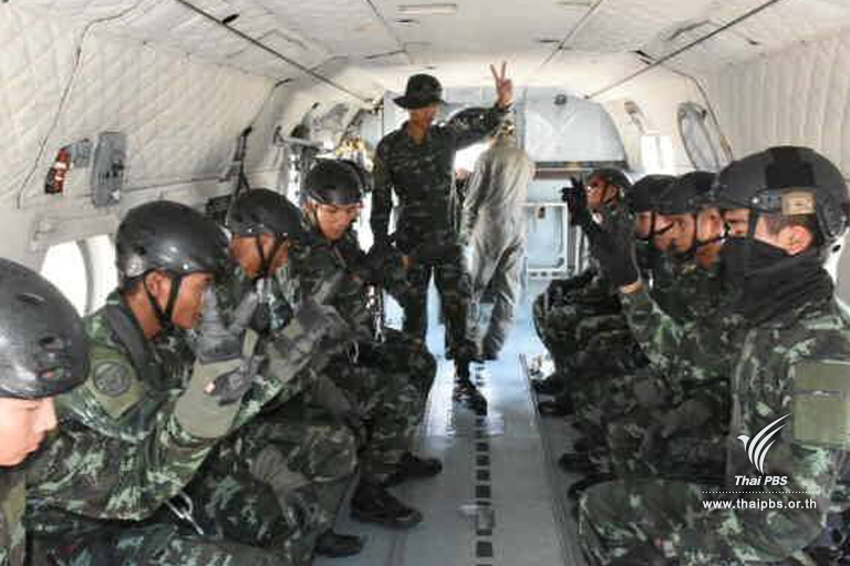 Army special force deployed to look for tunnel or crack on mountain top to get into cave