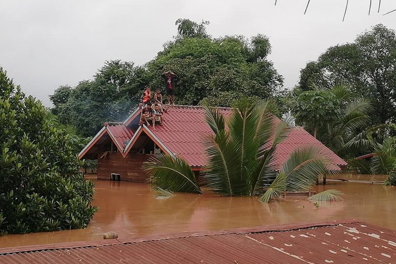 Relief aid pours in for Laos as search for missing continues