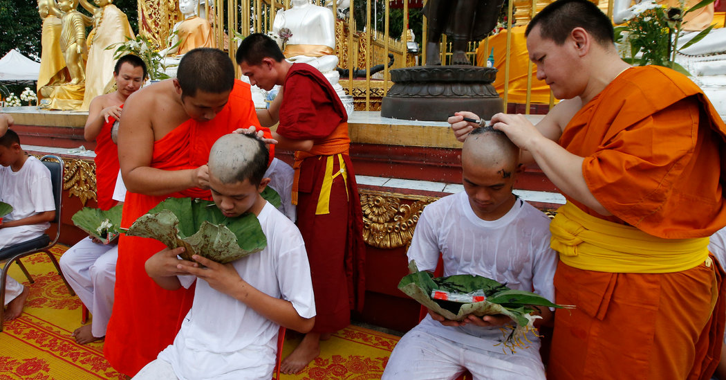 Thai Boys Become Monks as Rescuer’s Widow Looks On