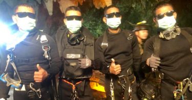 Applause and cheers greet international and Navy SEAL divers