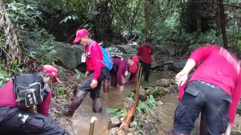 Authorities trying to stop water from flowing into cave