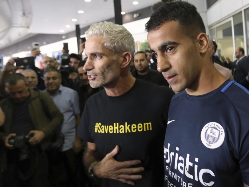 Refugee footballer returns to hero’s welcome in Australia after Thailand sets him free