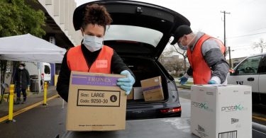 Key medical glove factories cutting staff 50% amid virus