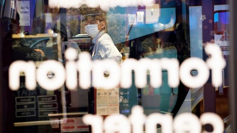 The Latest: UK advises against foreign travel amid virus