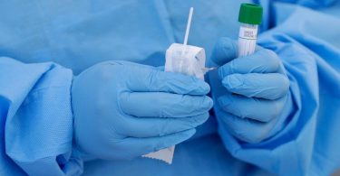 Chaos, inconsistency mark launch of drive-thru virus testing