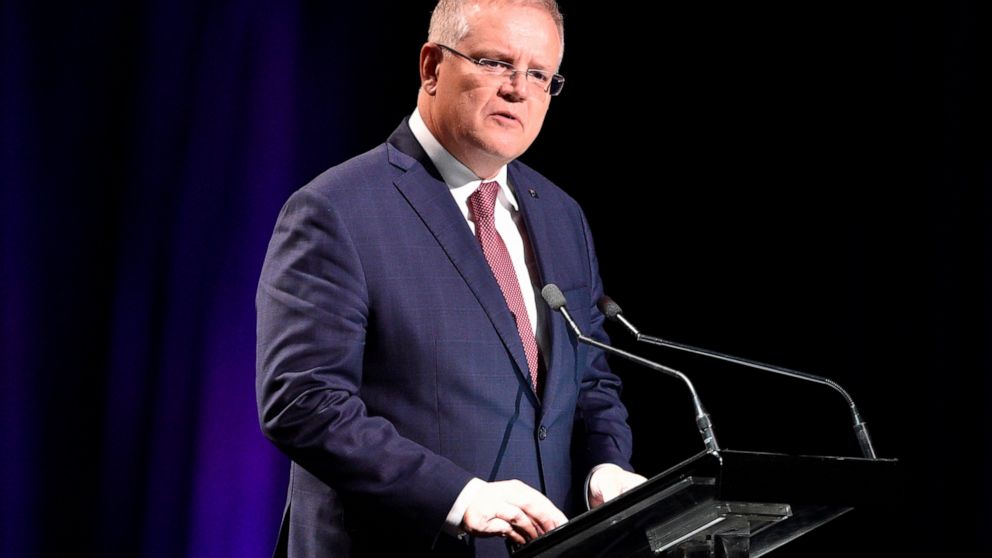 The Latest: Australia to isolate arriving travelers 2 weeks