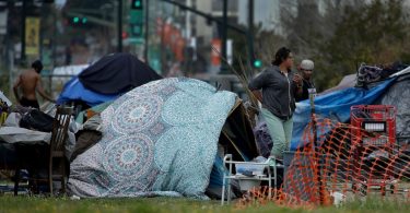 California rushes to prevent virus spread among the homeless