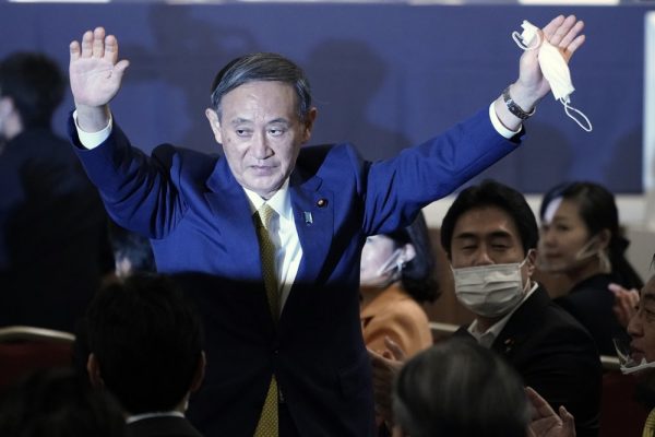 Yoshihide Suga wins party vote for Japan prime minister