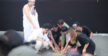 Protesters replant “spirit of democracy” in royal field