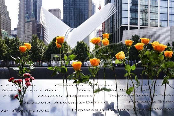 US remembers 9/11, with virus altering familiar tributes