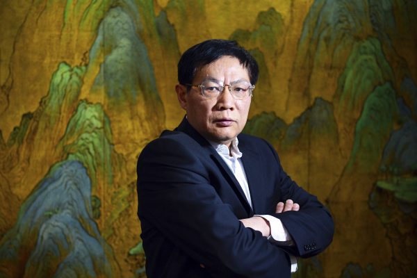 Critic of Chinese leader sentenced to 18 years in graft case