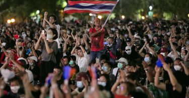 Thai protesters challenge monarchy as huge rally escalates