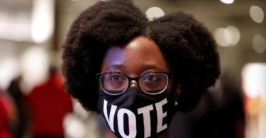 Economy, pandemic overshadow climate for young U.S. voters