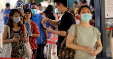 Singapore temporarily halts use of two flu vaccines after S.Korea deaths