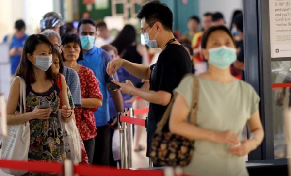 Singapore temporarily halts use of two flu vaccines after S.Korea deaths