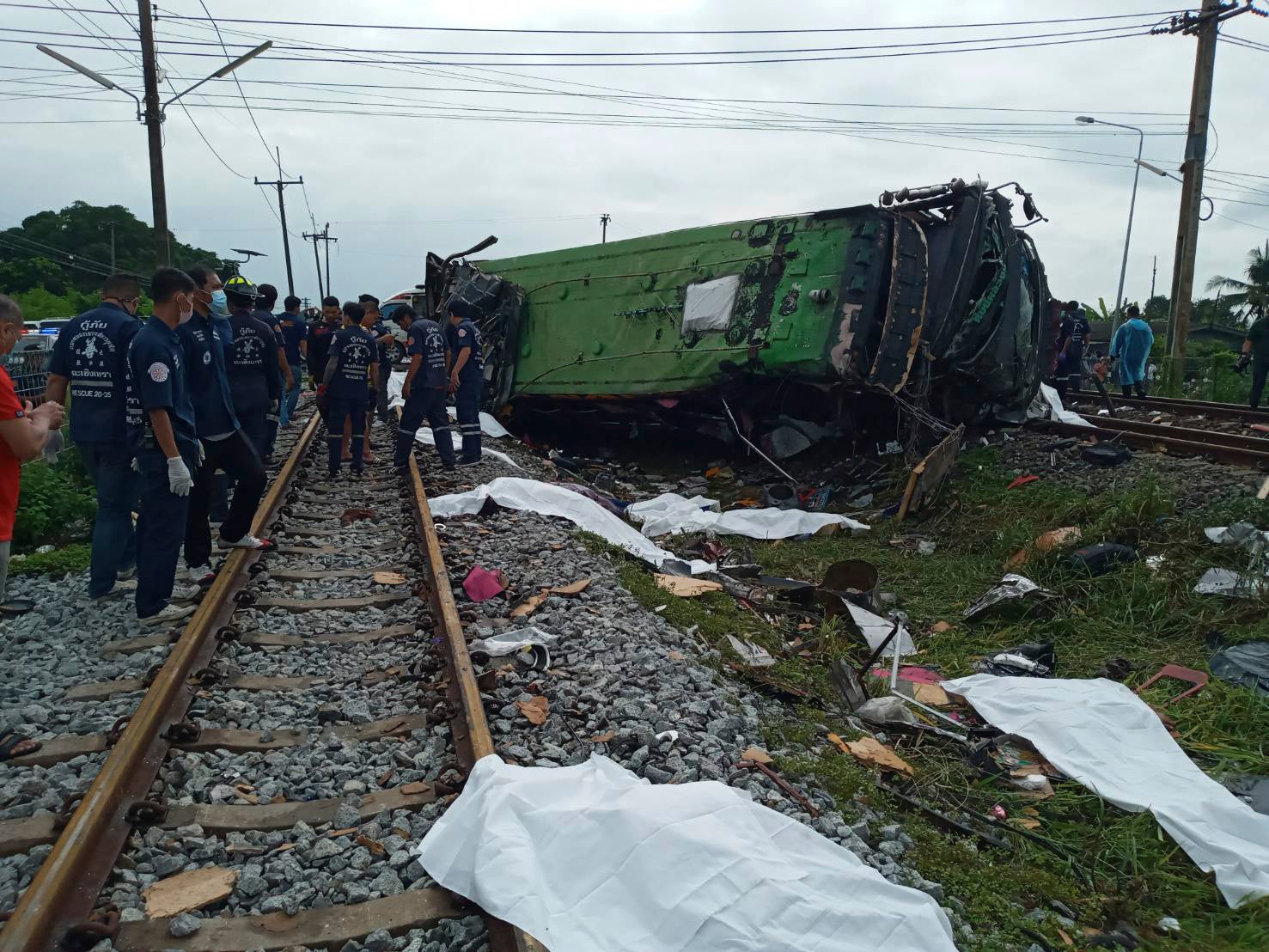Bus-train collision in central Thailand leaves 17 dead Thailand train Bangkok AP People