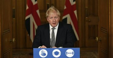 Johnson locks down England as UK COVID-19 cases pass 1 million