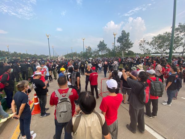 Anti-establishment protesters rally on Aksa Road in Thon Buri