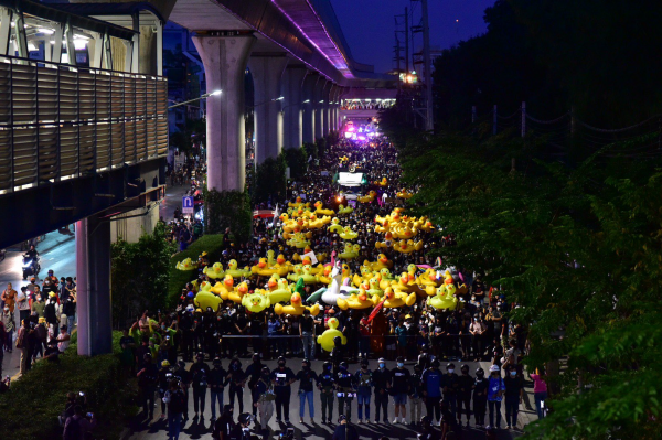 Protesters march to the 11th Infantry Regiment’s barracks to rally until 10pm