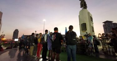 Ratsadon protesters rally at the statue of King Taksin the Great to pay homage