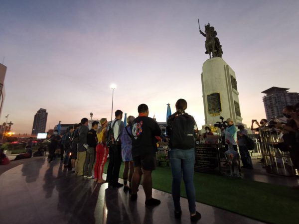 Ratsadon protesters rally at the statue of King Taksin the Great to pay homage