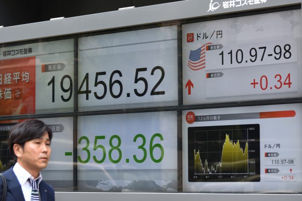 Most Asian markets advance after Wall St sets new records