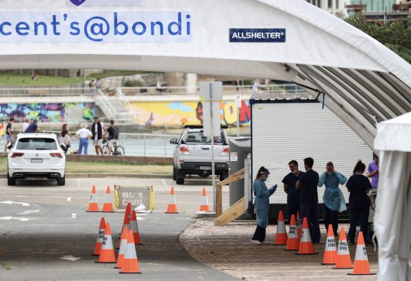 Australian states impose border curbs as Sydney COVID-19 cluster grows