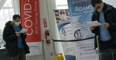 New Year arrives with US hitting 20 million Covid cases
