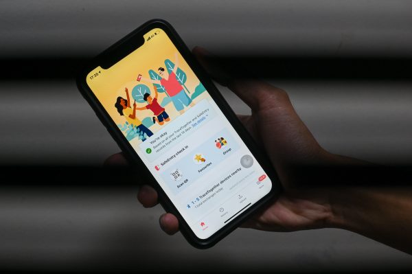 Singapore admits police can access contact-tracing data
