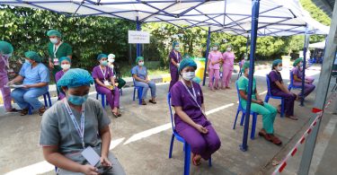 Health workers in virus-hit Myanmar start anti-coup protests health workers Myanmar cases workers AP