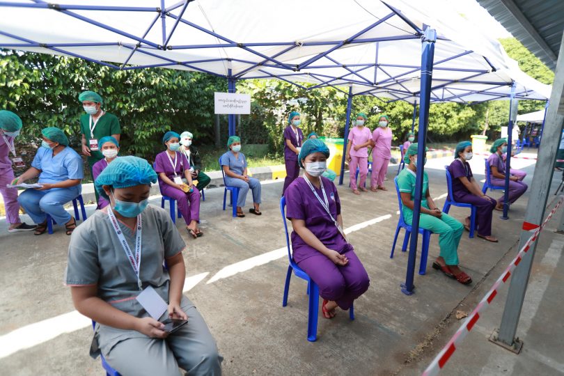 Health workers in virus-hit Myanmar start anti-coup protests health workers Myanmar cases workers AP