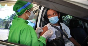 Bali kicks off drive-thru virus jabs for hospitality workers