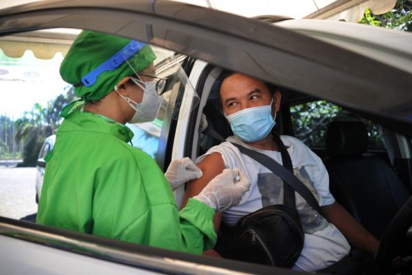 Bali kicks off drive-thru virus jabs for hospitality workers