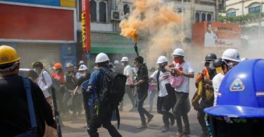 Myanmar protesters rally after overnight raids on opposition figures