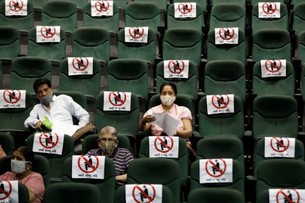 India coronavirus cases surge to four-month high, some lockdowns return