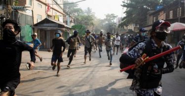 Troops fire at funeral as Myanmar mourns bloodiest day since coup