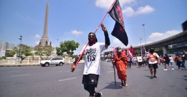 Ex-Thammasat U rector Charnvit joins protesters to demand release of protesters held on remand