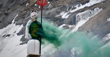 Swiss blow up huge snowman in mountains for first time