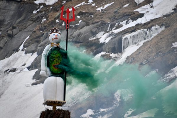 Swiss blow up huge snowman in mountains for first time