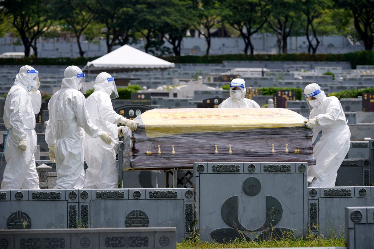 AP PHOTOS: Malaysian cemeteries face coronavirus surge South Africa Kuala Lumpur Health Business South African