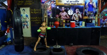 Punching out of poverty: Despite risks, nine-year-old Thai fighter eager to return to ring