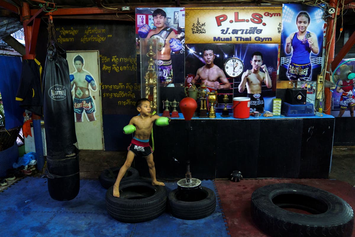 Punching out of poverty: Despite risks, nine-year-old Thai fighter eager to return to ring