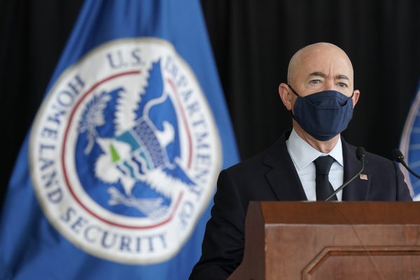 US formally ends policy for asylum-seekers to wait in Mexico