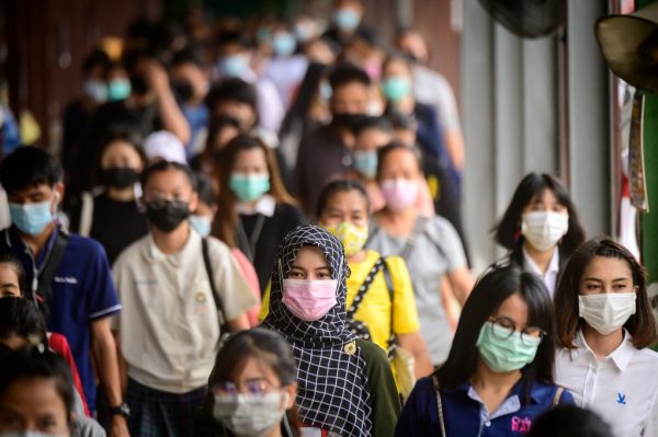 Wearing two face masks may be needed as Thailand logs 5,420 new COVID-19 cases Tuesday