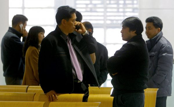 Two Koreas restore severed communications in surprise thaw