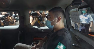 Hong Kong protester given 9-year term in 1st security case