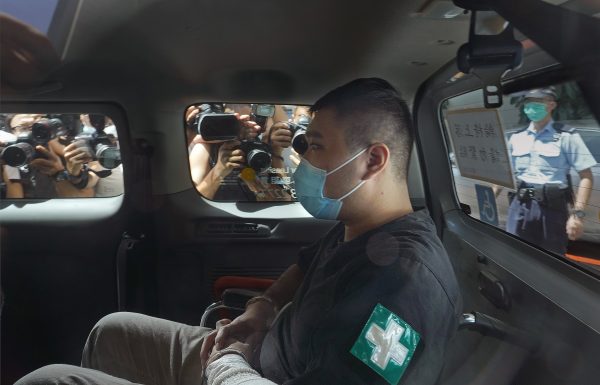 Hong Kong protester given 9-year term in 1st security case