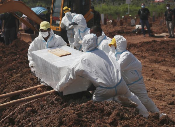Indonesia surpasses 100,000 deaths amid new virus wave